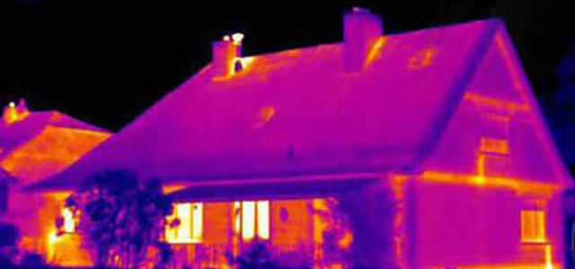 infrared photo of a house in yellow, pink, purple and blue