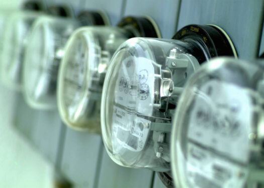 Close up photo of glass covered elctric meters